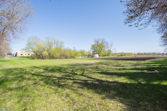 6673 230th St N, Cromwell Twp, MN 56549 - view of grassy yard featuring a rural view