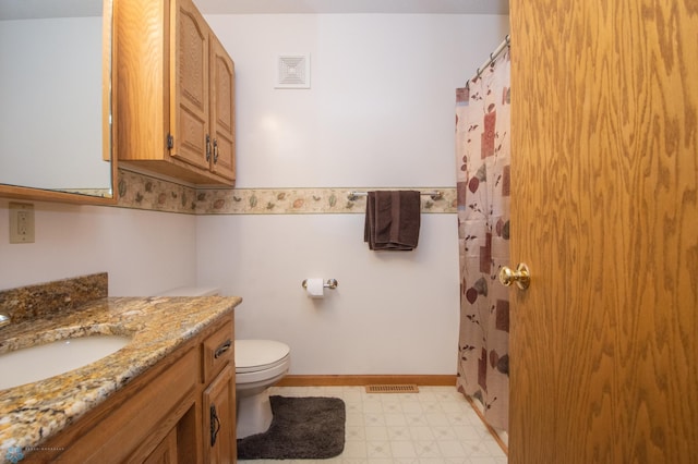 6673 230th St N, Cromwell Twp, MN 56549 - full bath with toilet, tile patterned floors, vanity, and a shower with curtain