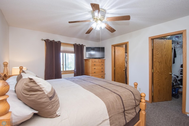 6673 230th St N, Cromwell Twp, MN 56549 - carpeted bedroom with a walk in closet, ceiling fan, and a closet