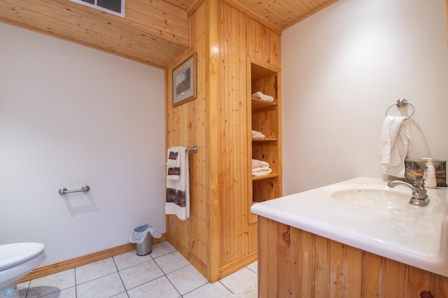 6673 230th St N, Cromwell Twp, MN 56549 - bathroom featuring wooden ceiling, toilet, tile patterned flooring, baseboards, and vanity