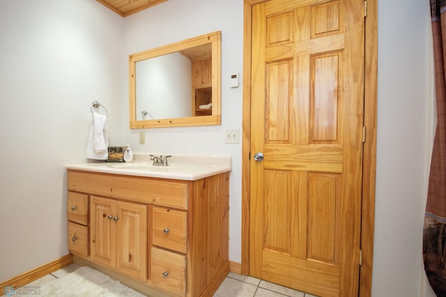 6673 230th St N, Cromwell Twp, MN 56549 - bathroom featuring vanity, tile patterned floors, and baseboards