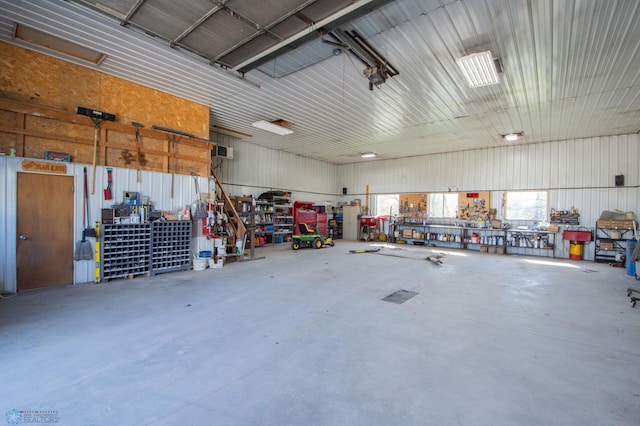 6673 230th St N, Cromwell Twp, MN 56549 - garage featuring a workshop area