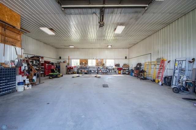 6673 230th St N, Cromwell Twp, MN 56549 - garage featuring a workshop area