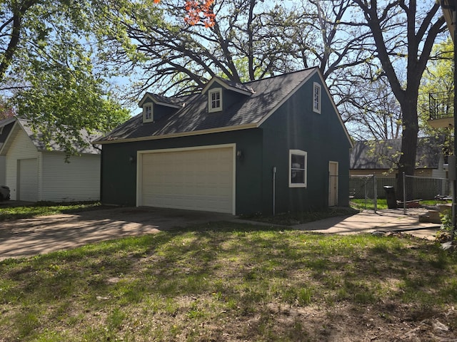 view of home's exterior with fence
