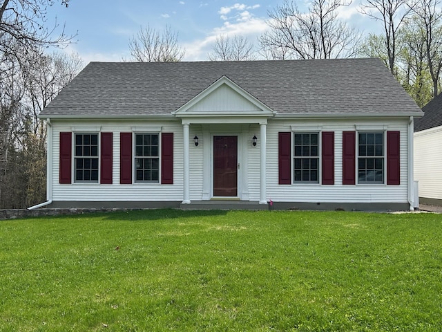 12176 2nd St, Northome, MN 56661 - view of front of house with a front lawn and a shingled roof