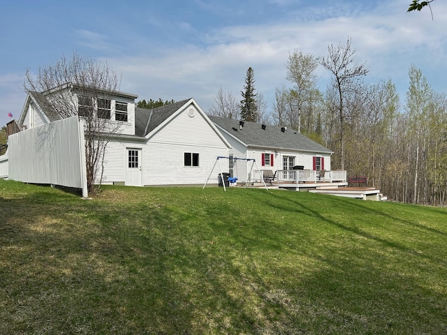 12176 2nd St, Northome, MN 56661 - back of property with a deck and a yard