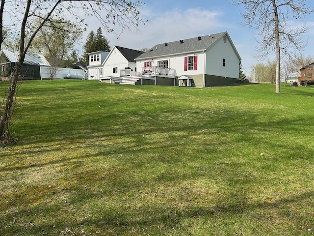 12176 2nd St, Northome, MN 56661 - view of grassy yard with a deck