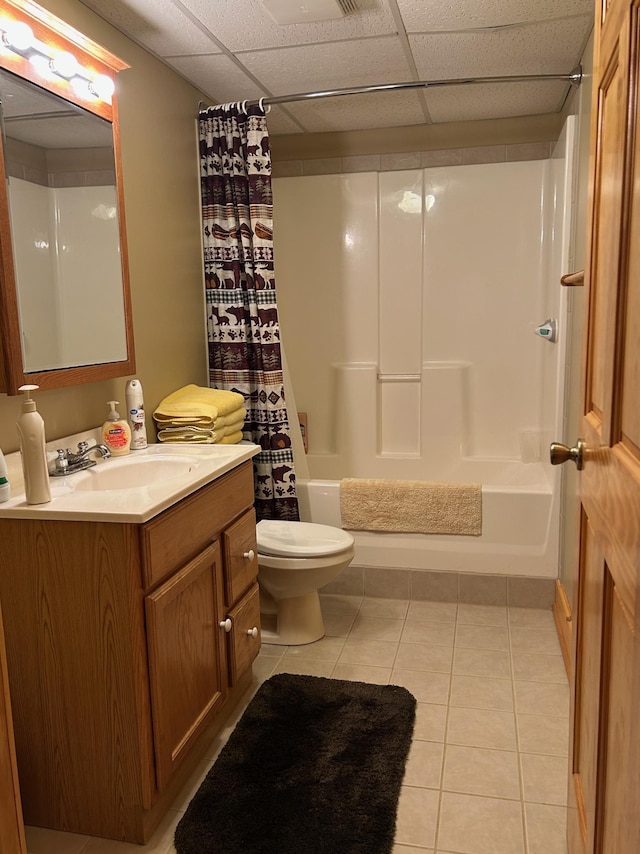 12176 2nd St, Northome, MN 56661 - bathroom featuring tile patterned floors, vanity, shower / bath combo with shower curtain, and a drop ceiling