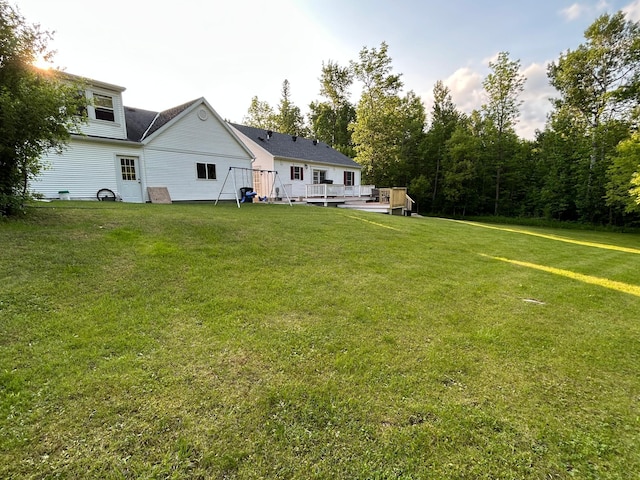 12176 2nd St, Northome, MN 56661 - view of grassy yard with a deck