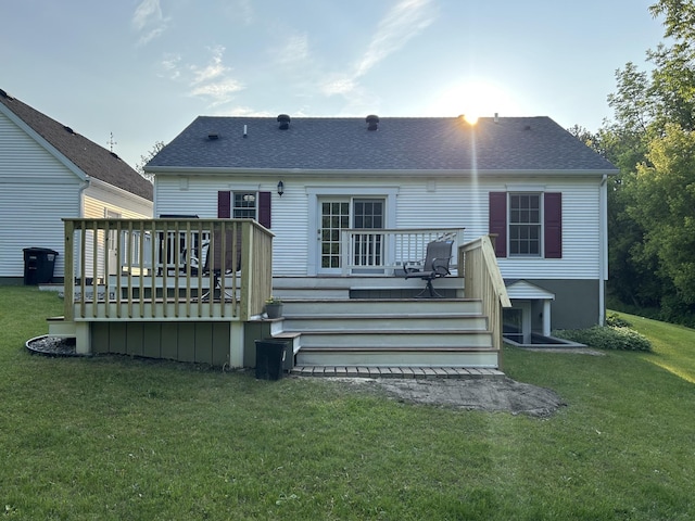 12176 2nd St, Northome, MN 56661 - back of house featuring a wooden deck, a yard, stairway, and a shingled roof