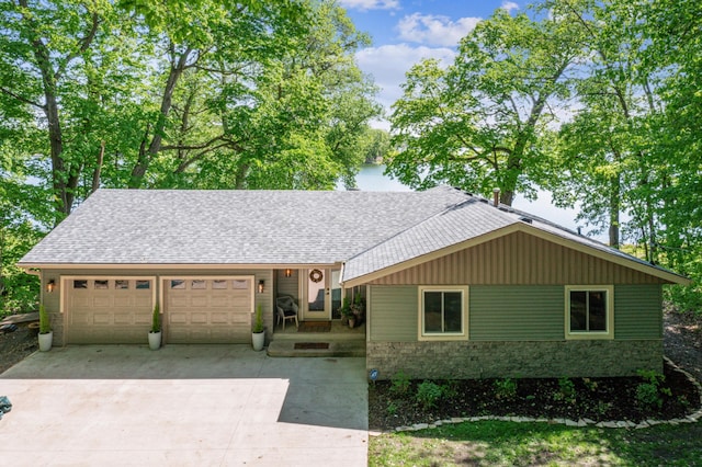 49935 Acacia Trl, Nessel Twp, MN 55080 - single story home with an attached garage, driveway, and roof with shingles