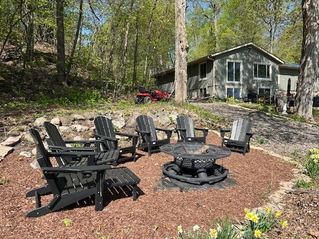 49935 Acacia Trl, Nessel Twp, MN 55080 - view of yard featuring a fire pit