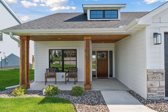 9975 Kari Way, Elko New Market, MN 55020 - doorway to property with covered porch and a shingled roof