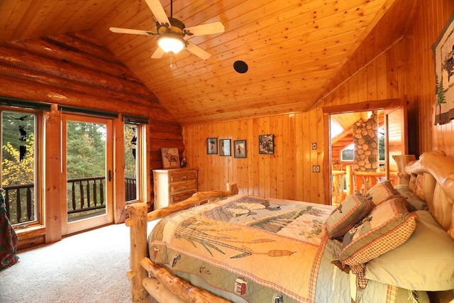 7236 Far N Rd, Buyck, MN 55771 - carpeted bedroom featuring vaulted ceiling, access to outside, wood walls, and wooden ceiling