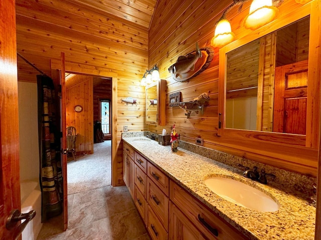 7236 Far N Rd, Buyck, MN 55771 - bathroom featuring wooden walls, double vanity, and wooden ceiling