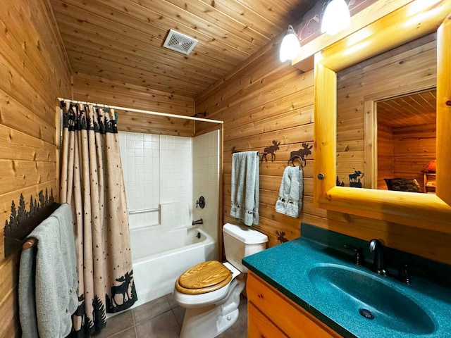 7236 Far N Rd, Buyck, MN 55771 - bathroom with wooden walls, tile patterned floors, toilet, shower / tub combo, and vanity