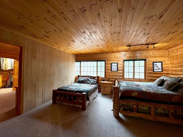 7236 Far N Rd, Buyck, MN 55771 - carpeted bedroom featuring track lighting, wooden ceiling, and log walls