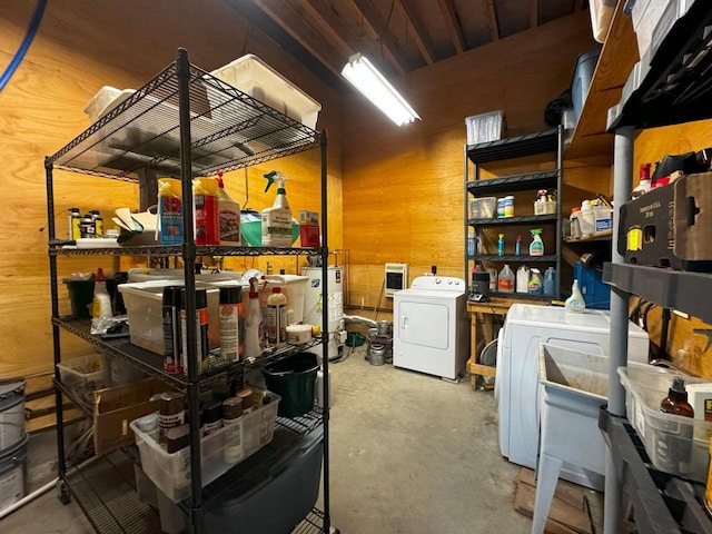 7236 Far N Rd, Buyck, MN 55771 - storage room with independent washer and dryer and gas water heater