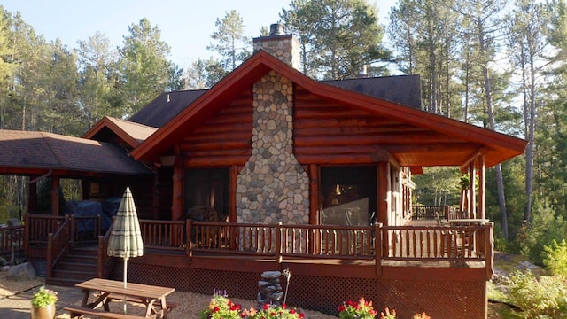 7236 Far N Rd, Buyck, MN 55771 - view of front of home featuring a chimney and a shingled roof