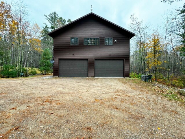 7236 Far N Rd, Buyck, MN 55771 - view of home's exterior with an attached garage and driveway