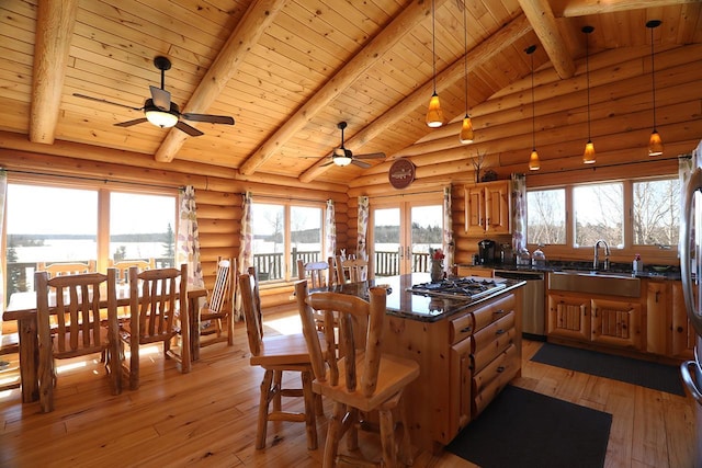 3165 Randa Rd, Orr, MN 55771 - kitchen featuring a sink, stainless steel appliances, wooden ceiling, ceiling fan, and a center island