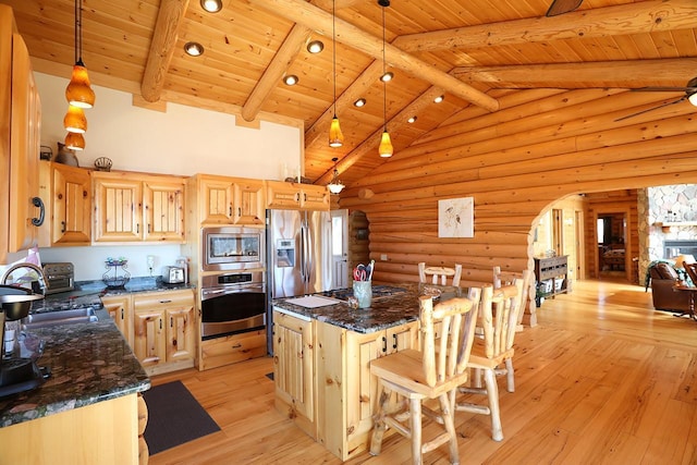 3165 Randa Rd, Orr, MN 55771 - kitchen with stainless steel appliances, light brown cabinetry, a center island, light wood-style floors, and wood ceiling