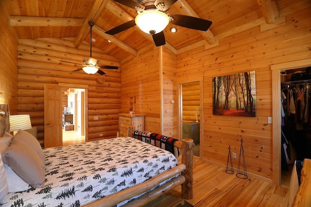 3165 Randa Rd, Orr, MN 55771 - bedroom featuring wooden ceiling, wood finished floors, beamed ceiling, rustic walls, and a closet