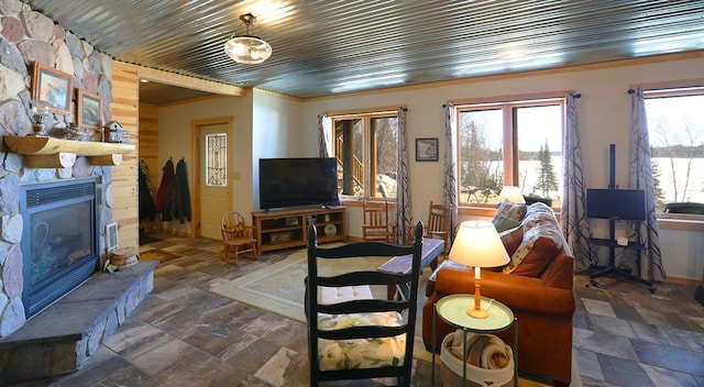 3165 Randa Rd, Orr, MN 55771 - living room with a fireplace and stone finish floors