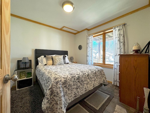 3165 Randa Rd, Orr, MN 55771 - bedroom with ornamental molding, stone finish flooring, and baseboards