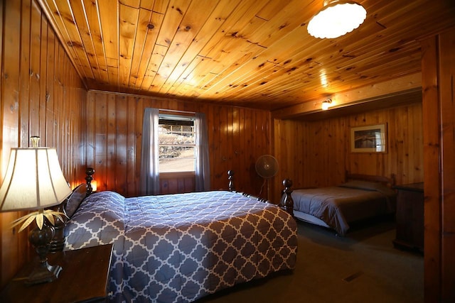 3165 Randa Rd, Orr, MN 55771 - carpeted bedroom featuring wood walls and wood ceiling