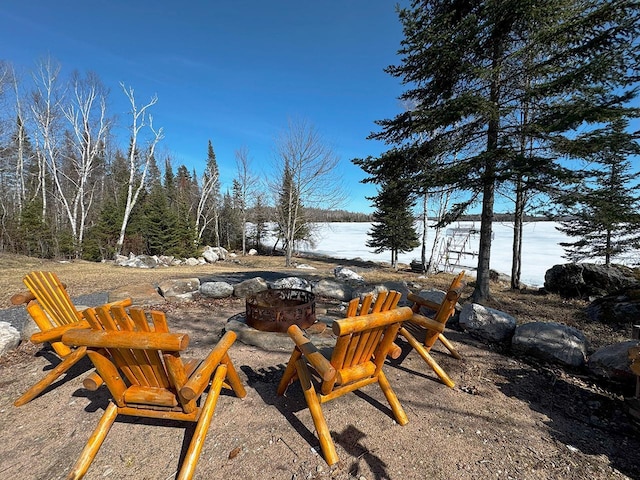 3165 Randa Rd, Orr, MN 55771 - view of yard featuring an outdoor fire pit and a water view