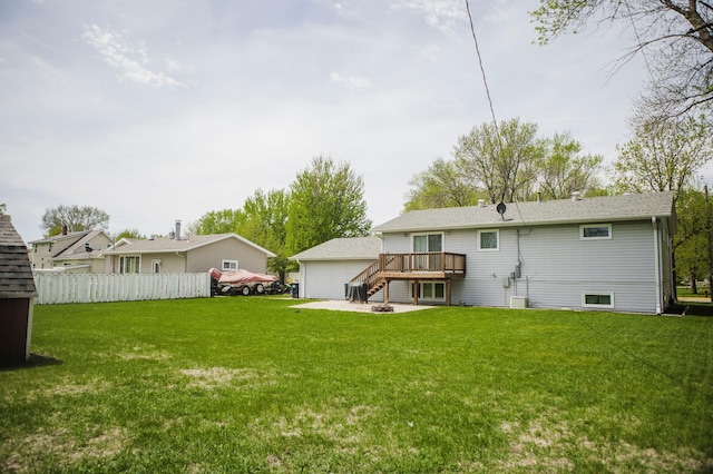 back of property featuring a deck, a patio, and stairs
