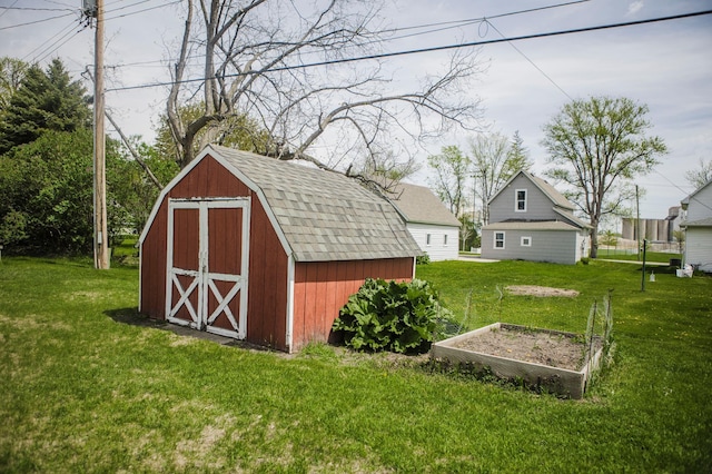view of shed with a vegetable garden