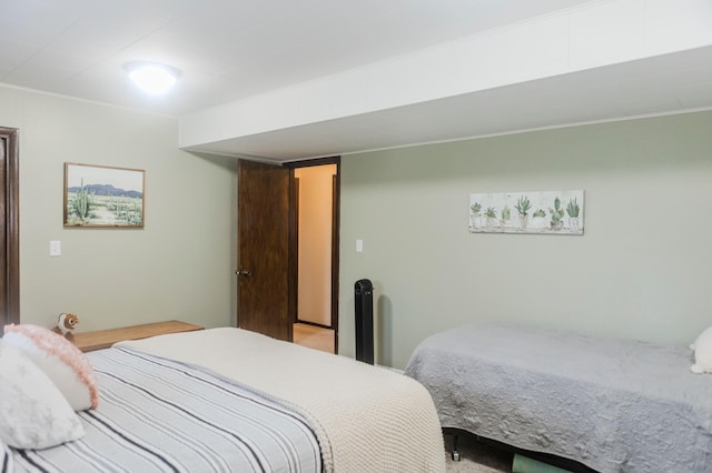 bedroom with ornamental molding