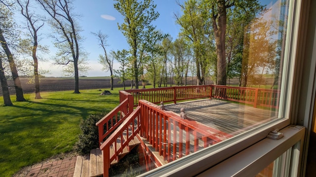 wooden terrace with a view of rural / pastoral area