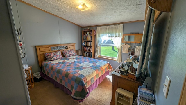 bedroom featuring a textured ceiling, carpet floors, and ornamental molding