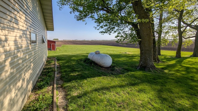view of green lawn with a view of rural / pastoral area