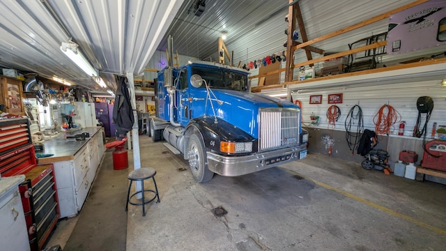 garage with a workshop area