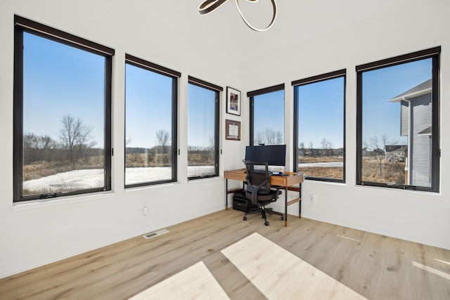 12745 Stutz Ct NE, Blaine, MN 55449 - office featuring wood finished floors and baseboards