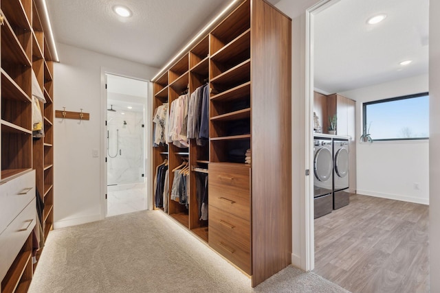 12745 Stutz Ct NE, Blaine, MN 55449 - walk in closet with separate washer and dryer