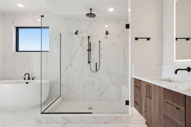 12745 Stutz Ct NE, Blaine, MN 55449 - bathroom featuring a marble finish shower, vanity, a freestanding bath, and recessed lighting