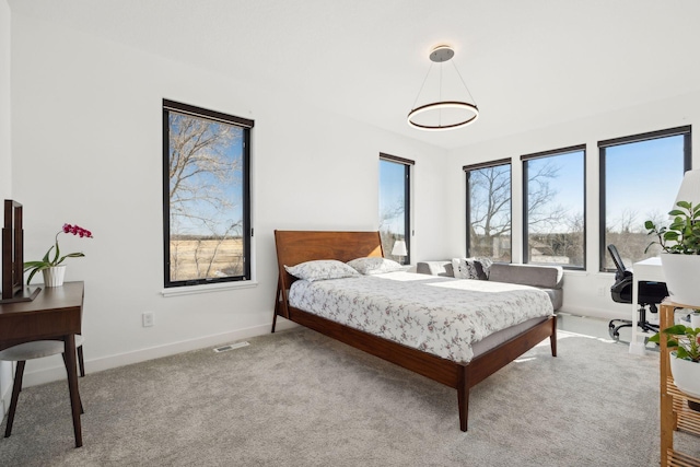 12745 Stutz Ct NE, Blaine, MN 55449 - bedroom featuring baseboards and carpet flooring