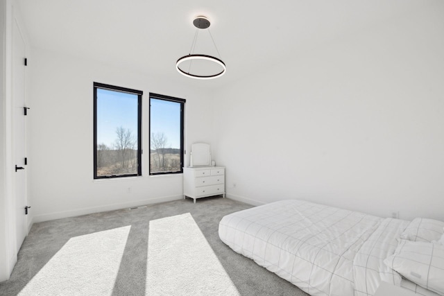 12745 Stutz Ct NE, Blaine, MN 55449 - bedroom featuring light colored carpet and baseboards