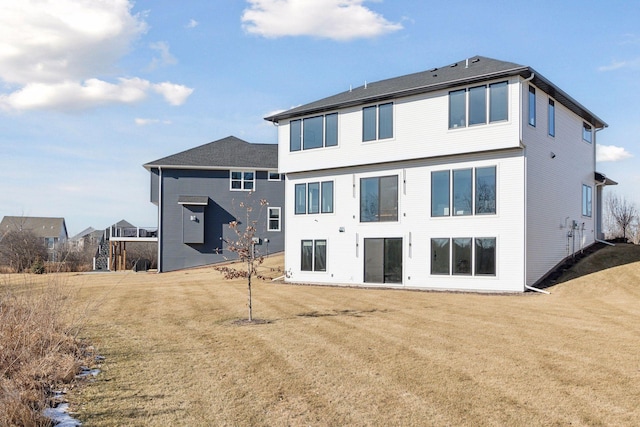 12745 Stutz Ct NE, Blaine, MN 55449 - rear view of house with a lawn