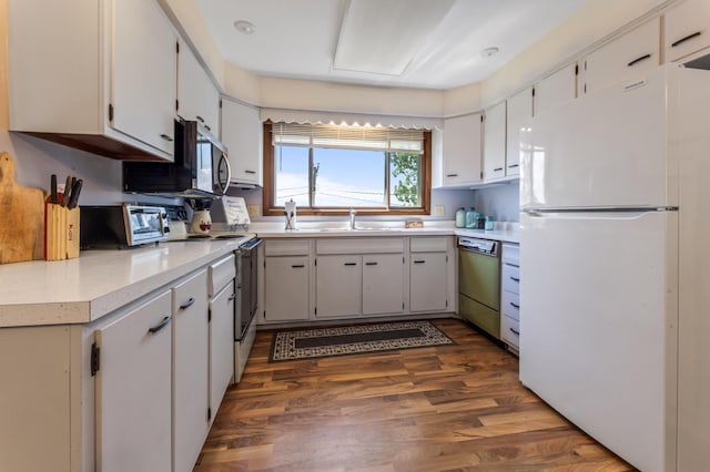 304 2nd St, Alma, WI 54610 - kitchen featuring freestanding refrigerator, dishwasher, range with electric cooktop, stainless steel microwave, and a sink