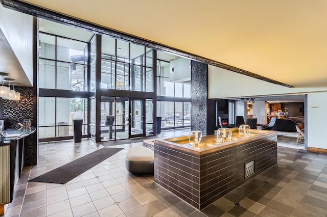 lobby featuring a towering ceiling