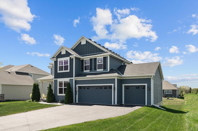 4118 San Vitero Ct, Victoria, MN 55318 - view of front of house with board and batten siding, driveway, a front lawn, and an attached garage