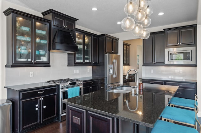 4118 San Vitero Ct, Victoria, MN 55318 - kitchen featuring appliances with stainless steel finishes, a sink, custom range hood, backsplash, and recessed lighting
