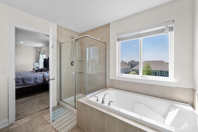 4118 San Vitero Ct, Victoria, MN 55318 - bathroom with a stall shower, ensuite bath, and a garden tub