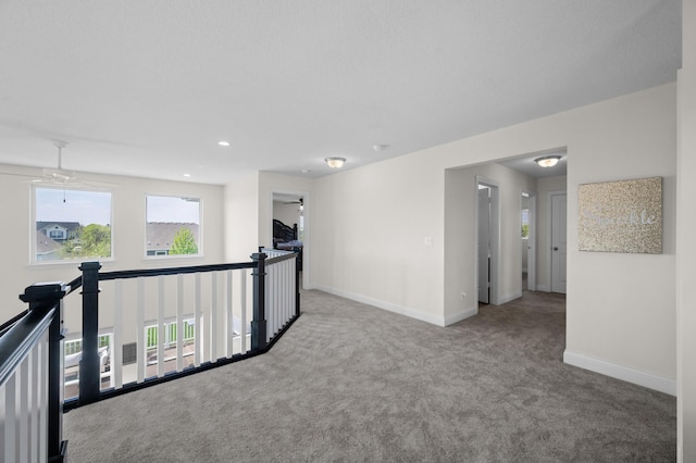 4118 San Vitero Ct, Victoria, MN 55318 - corridor featuring carpet floors, baseboards, an upstairs landing, and recessed lighting